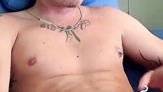 Handsome blonde explores his butt while blowing smoke