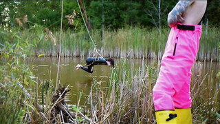 Lezdom babe in erotic assfucking domination by a quiet serene river