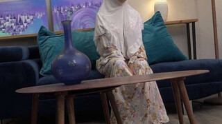 Sexy wifey in hijab has a hot surprise for her hubby