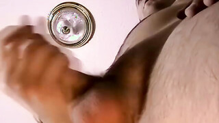 Straight guy Jake faps his prick & splashes on the camera