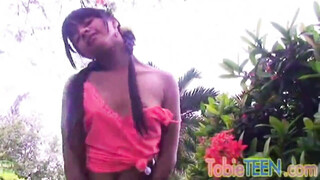 Tobie Teen Fingering her tight muff at garden