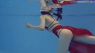 Marfa is charming timid Russian pornstar who gets naked in the pool