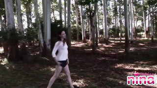 Lesbian Nina get nude showing natural tits & shaved cunt