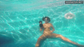 Amelie Bruna tasty brunette with big tits in the pool