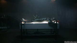 Bound ebony in latex beaver vibed