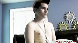 The attractive & sexy guy is smoking while he masturbates