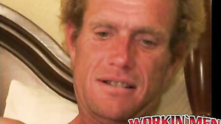 Mature dude strokes his heavy dick while smoking a cigar