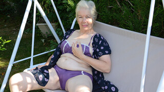 GRANNY playing in the garden with her muff