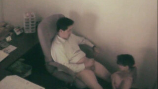 Horny bitch sucking asian guy in office