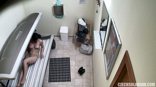 Brunette Hot Babe Relaxing in Solarium