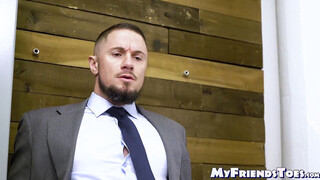 Suited gay businessman Skyy Knox worships his bosses feet