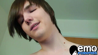 Lusty emo twink jerks off his huge dick & sprays big load