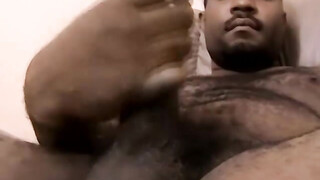 Sexy black stud KG jerks off his fat meat on his solo show