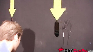 Handsome guys gets on their knees & suck cocks behind a cover