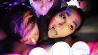 Sexy lesbos playing with fluorescent body paint