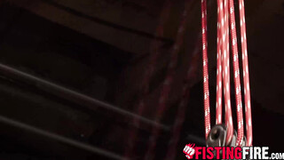 Uniformed interrogator Dirk Caber drives his fist into his helpless prisoner