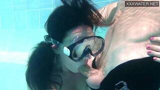 Cumshots underwater with two horny people