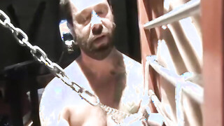 Poor submissive dude Chet Walker takes the painful heavy chain tugging his dick