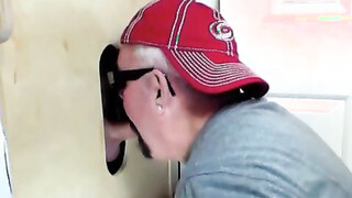 Meat hungry whore sucking delicious cocks in a gloryhole