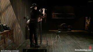 Redhead with neck trapped in device