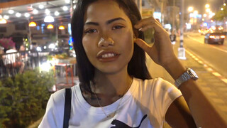 Adorable Thai teen with tattoos fucks a Farang on amateur sex video