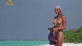 Bombshell Bo Derek showing off her unshaved cunt at the beach