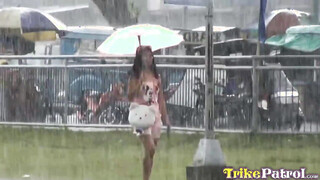 Picking up a filipina in a rainy day