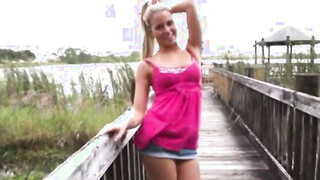 Lil Kelly on a walk outdoors having a great time by the lake