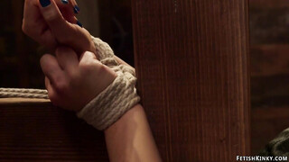 Blonde in wooden stock rough fucked