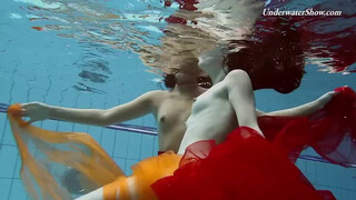 Mega sexy & wet lesbo girls swimming & stripping