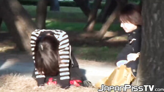 Japanese  pisses herself in public for us