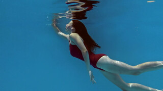 Sexy mixed race teen Fernanda Releve swimming naked