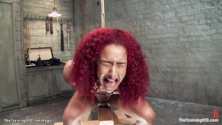 Redhead ebony made to fuck sex toys